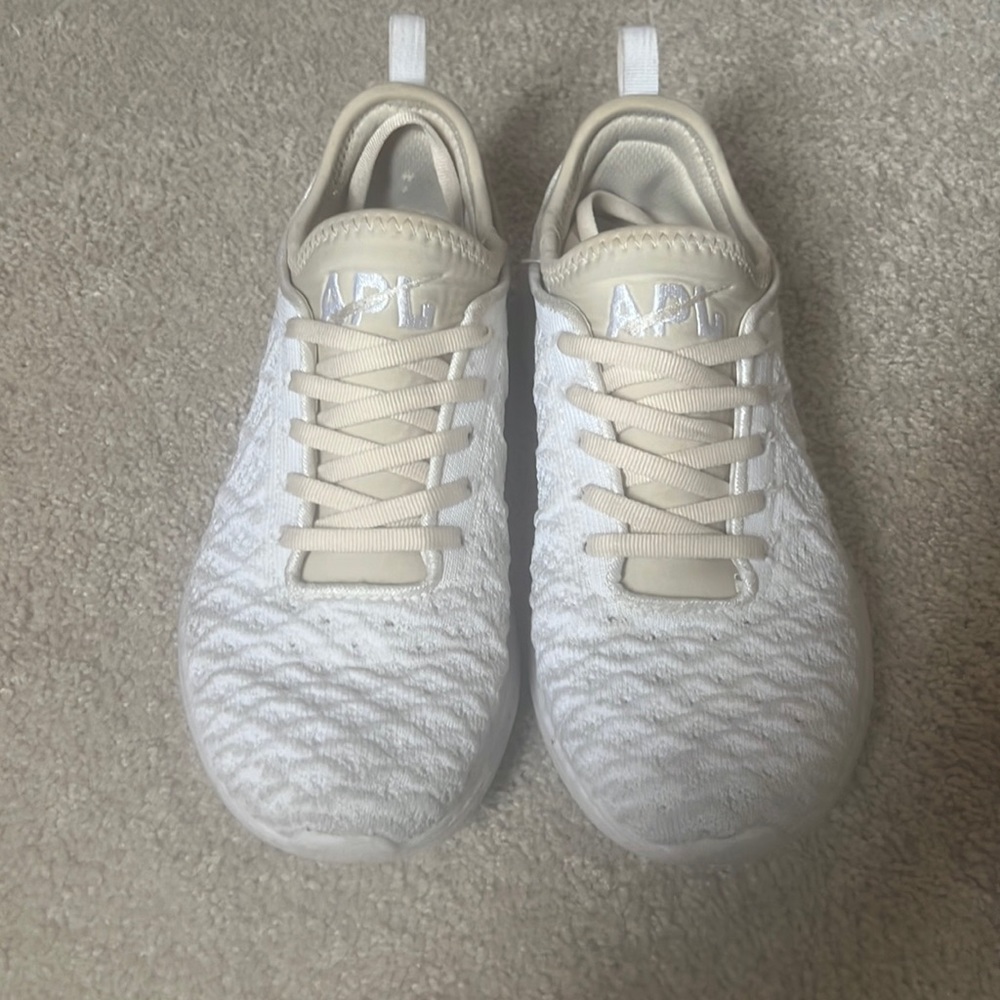 Apl propelium white and tan shoes